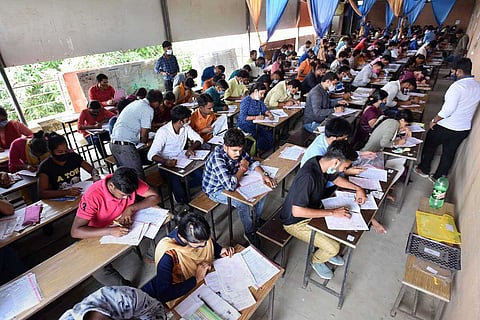 Candidates appearing for a test in Prayagraj in Uttar Pradesh 