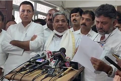 Randeep Surjewala, Siddaramaiah and DK Shivakumar addressing the media