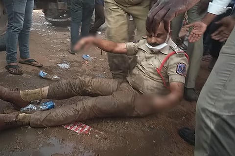 Officer after being rescued