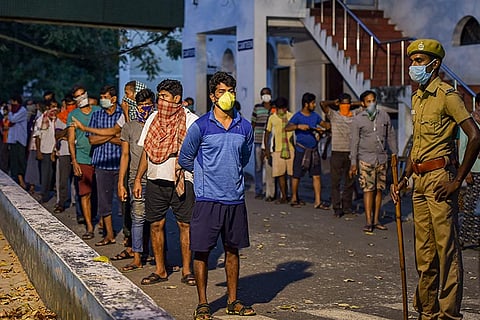 'I wish I was with my family': Migrant workers in shelters long to return home