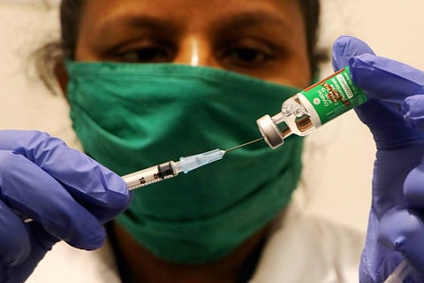 A representative image of a health workers using a COVID-19 vaccine