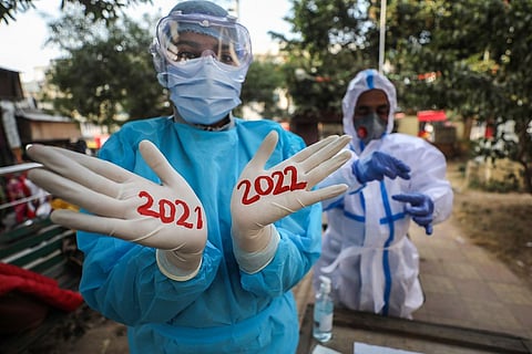A health worker in PPE suit