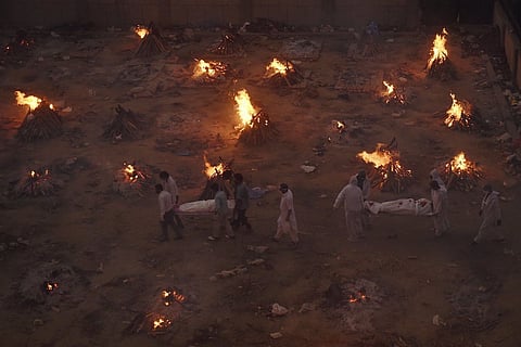 Journalists abused, called ‘vultures’ for reporting on COVID-19 cremations in India