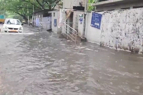 A car in a waterlogged street