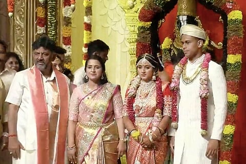 Karnataka Congress President DK Shivakumar and his wife Usha posing with daughter Aisshwarya and son-in-law Amartya
