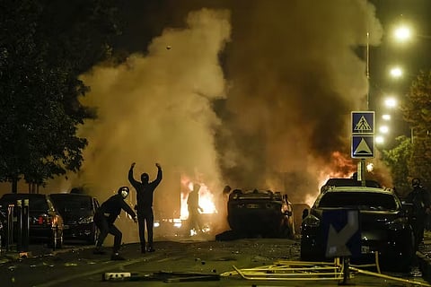 Locals clashed with police following the death of the teenager. EPA/Yoan Valat