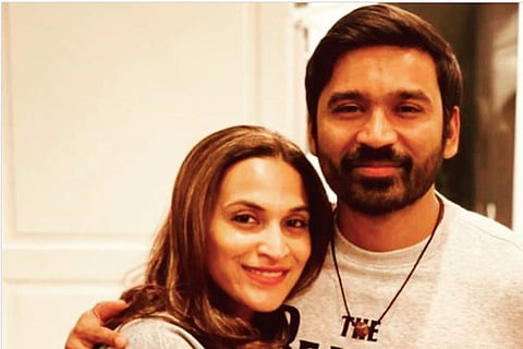 Dhanush and Aishwaryaa Rajinikanth in grey 