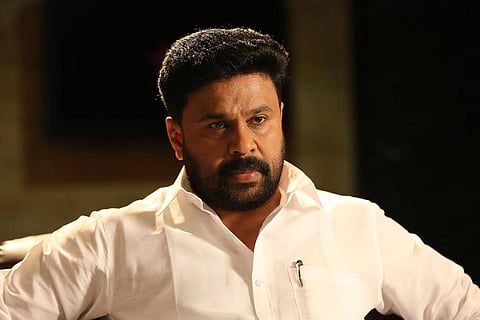 Dileep in a white shirt