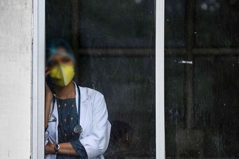 Doctor standing alone