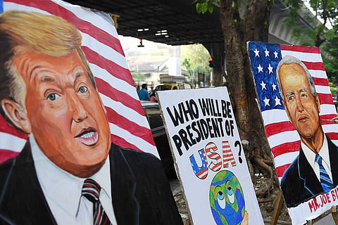 Paintings of Donald Trump and Joe Biden