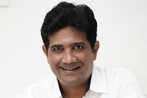 Dr Ezhilan