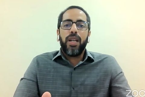 Screengrab of the video seminar in which Dr Muhammed Najeeb is seen speaking facing the camera
