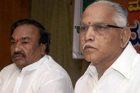 Eshwarappa and Yediyurappa sharing a frame