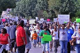 Slain African-American's family to sue Ferguson officer