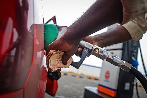 Representative image of a person filling fuel