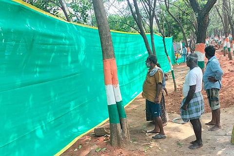 Green sheets put up to hide ASR Nagar colony in Vizag ahead of G20 meeting 