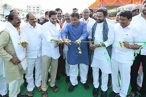 Gadkari and Jagan cutting a ribbon to inaugurate road projects in Andhra