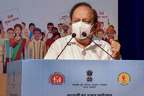 Harshvardhan wearing mask and addressing media 