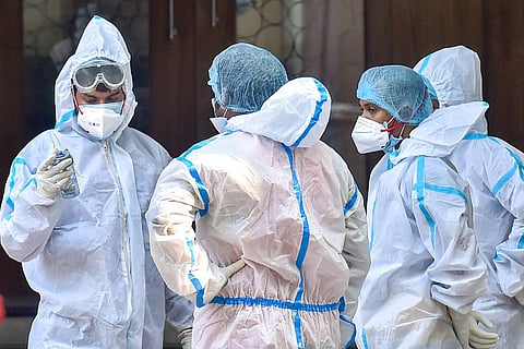 Frontline workers in India in PPE kits amid the coronavirus pandemic