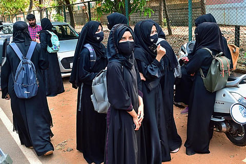 Group of burqa-clad students