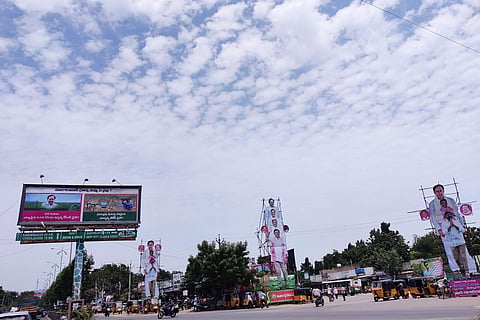 A main junction Huzurabad town accommodates campaign flexes 