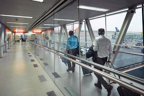 People walking at the airport terminal