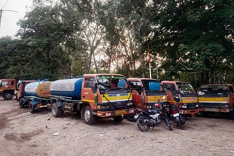 Water tankers parked outside the filling station