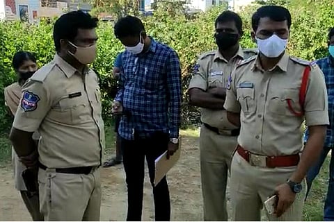 Police at the residence in Ameenpur where the techie and his family were found dead