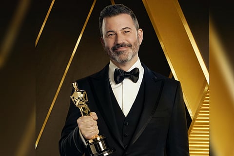 Jimmy Kimmel with Oscar Award in his hand