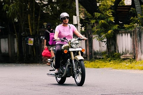 Jyothika rocks tough-girl look on a Bullet in new ‘Magalir Mattum’ poster