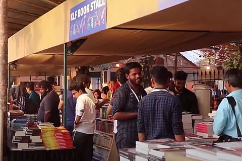 Image of lit fest participants at a book stall