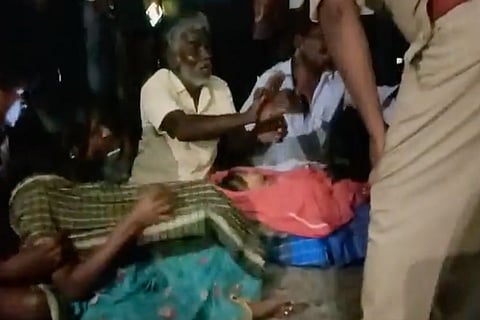 Family members of the victim protesting on the road