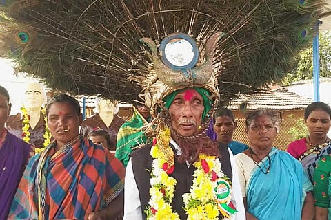 Kanaka Raju wearing the head gear 