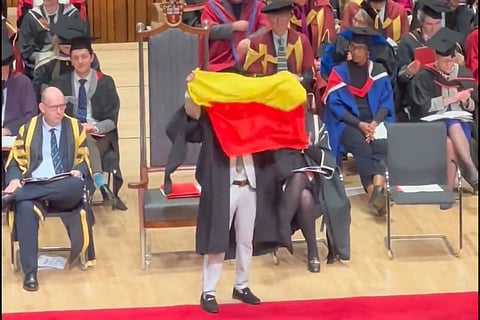 Indian student unfurls Karnataka flag during graduation ceremony at UK college. 