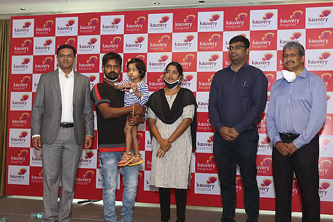 2-yr-old girl treated for lower back Spondylolisthesis with her parents