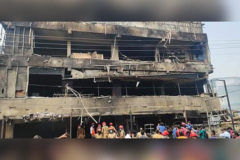 blackened multi storey hotel in Palakkad ruined in fire 