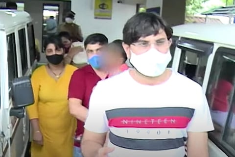 AG's office officials in Kerala coming out of a police station after filing complaint of assault 