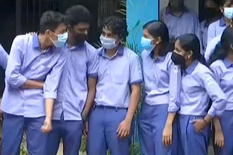 Students in gender-neutral uniform