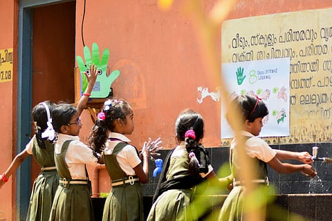 Students washing hands at a government school in Kerala, Many students have moved from private to government schools amid pandemic, with highest shift in Uttar Pradesh followed by Kerala, according to ASER 2021