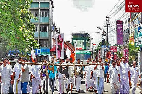 Kerala politicians beat street dogs to death, hang them on a pole and take out a parade