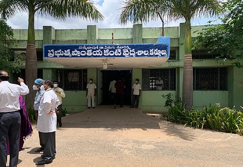 Healthcare workers standing outside Kurnool Government Hospital