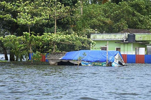 House submerged in flood