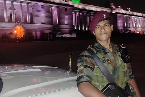 Lance Naik Sai Teja posing with his gun