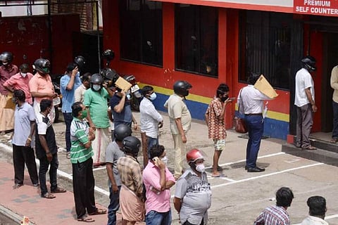 Queue outside a BevCo unit