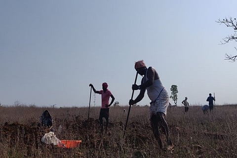 NREGA workers in Telangana engaged in work near a village