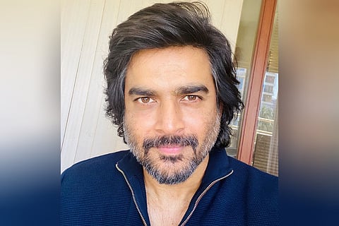 Actor Madhavan in a blue shirt
