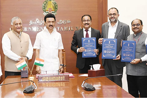 MK Stalin with officials after signing MoU