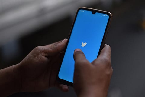 Representative image of a person using Twitter 