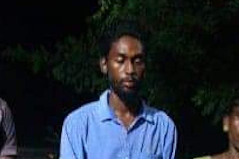 Manikandan in a blue shirt 