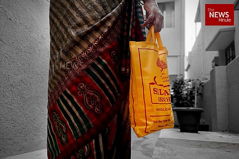 Representational image of a woman carrying a manjappai